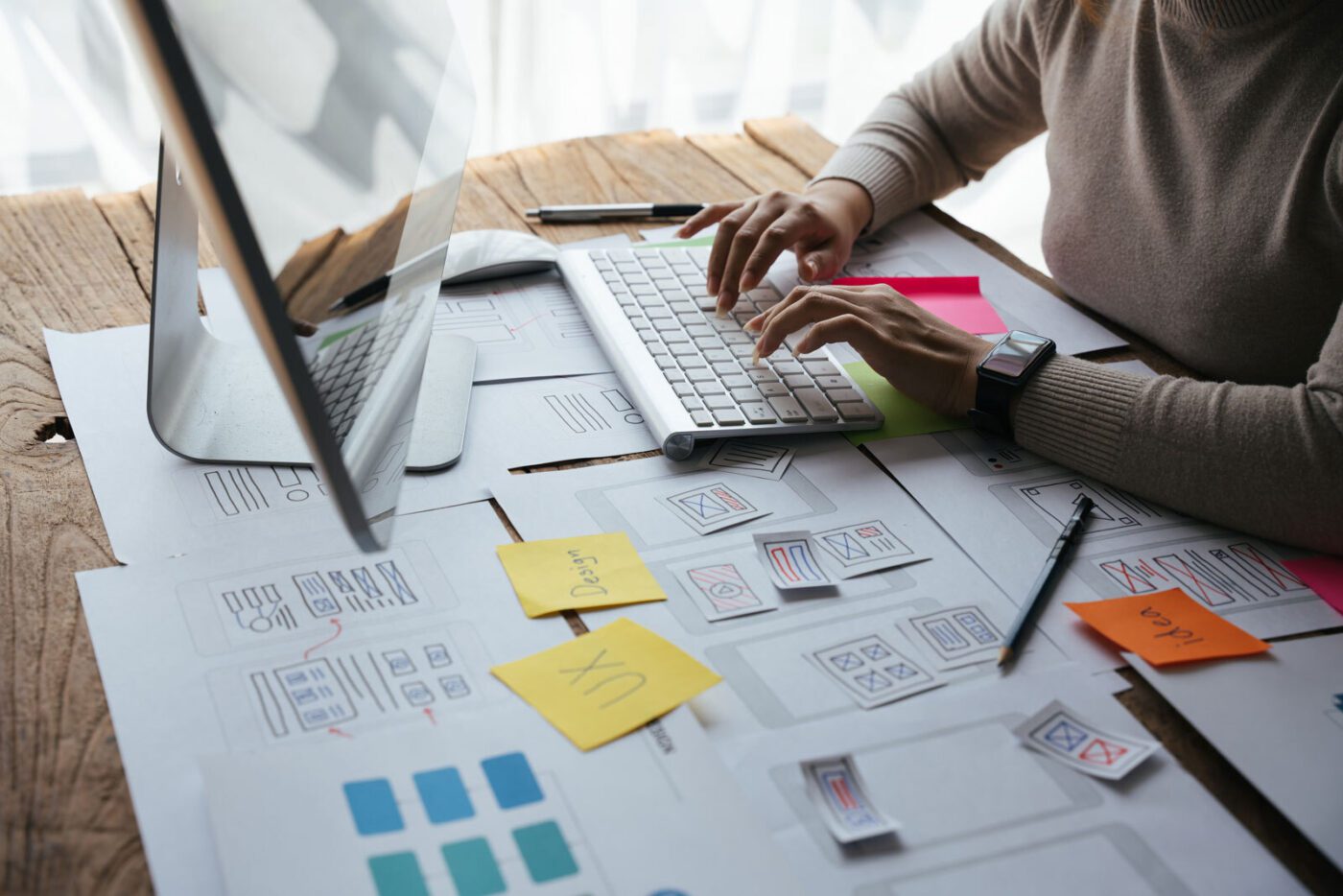 Black professional planning on a whiteboard